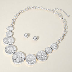 TEXTURED METAL PEBBLE DISC BEADED STATEMENT NECKLACE